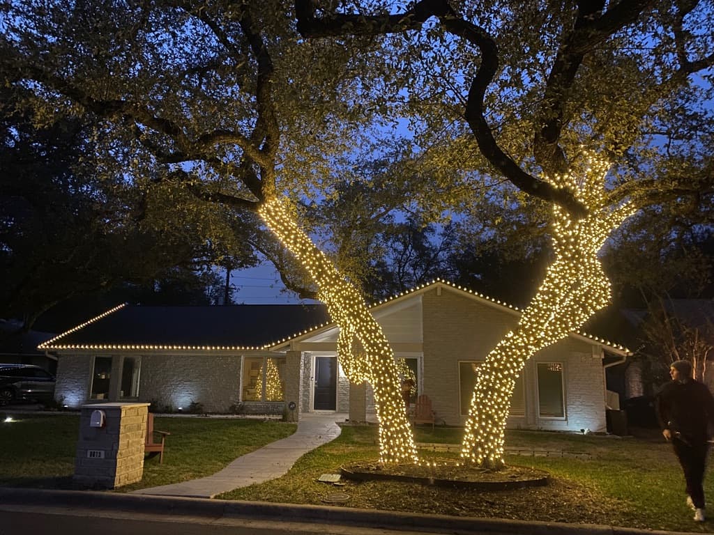 Austin home decorated with professional Christmas lights by Fifteen and Wired